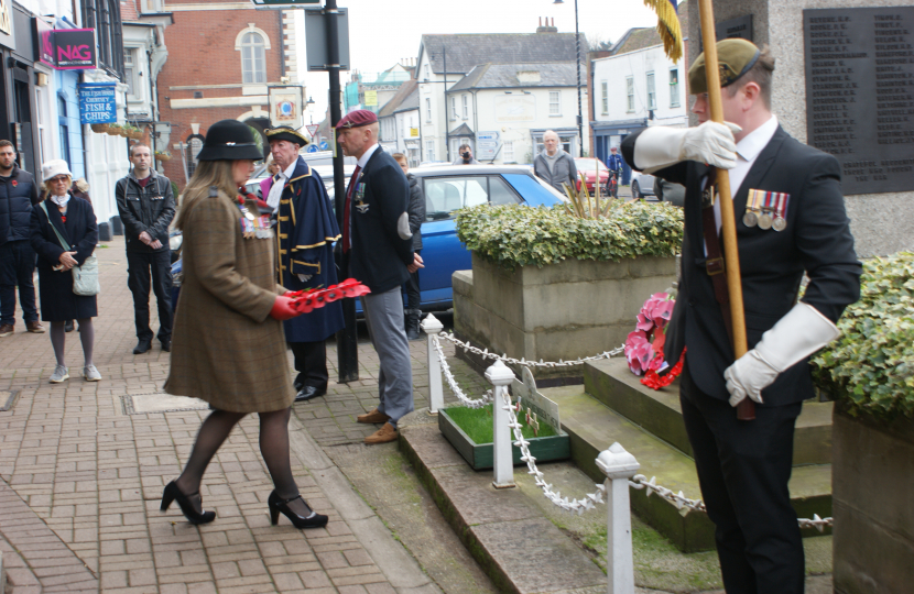 Shannon laying a poppy wreath at Chertsey War Memorial 
